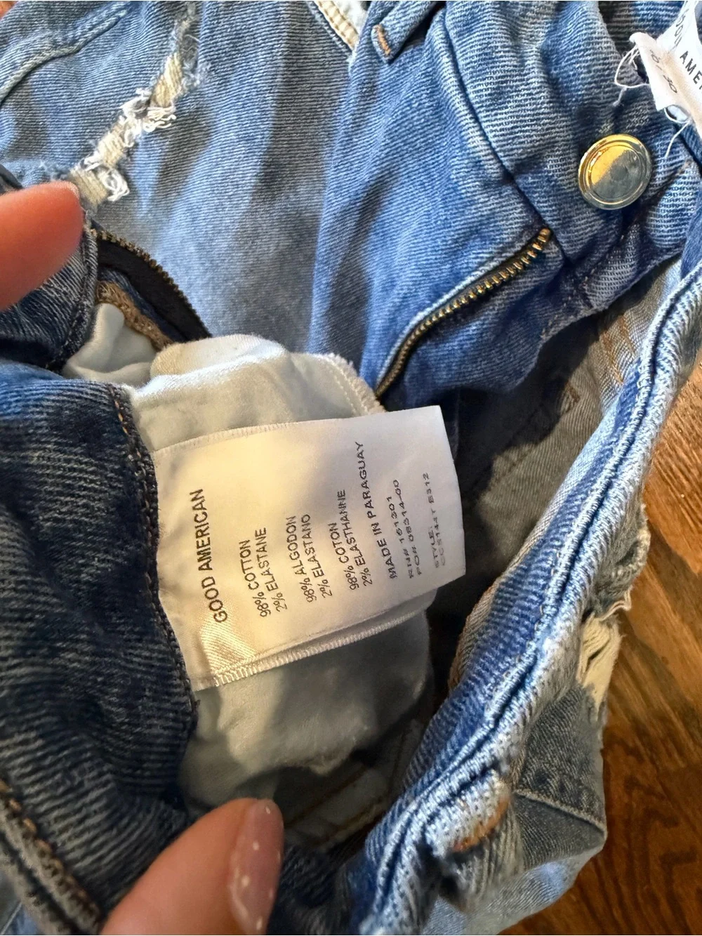 Good American Light Blue Denim Jeans with Subtle Distressing